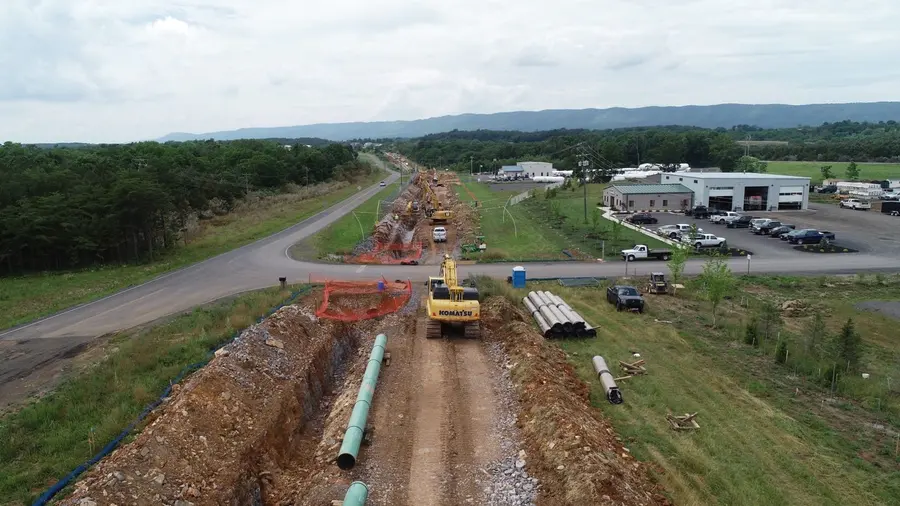 An Appalachian Pipeline spread working a right-of-way across the valley with the ridgeline behind